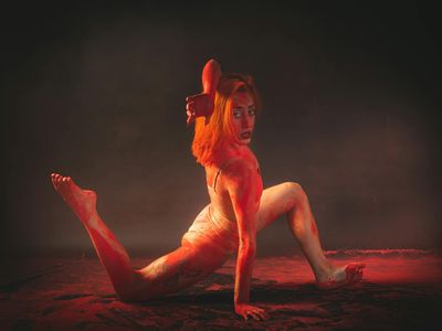 Person in a fluid yoga movement.